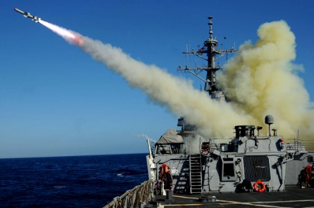 US Navy 101027-N-1854W-032 The guided-missile destroyer USS Mitscher (DDG 57) launches a Harpoon anti-ship missile at the ex-USNS Saturn during a s