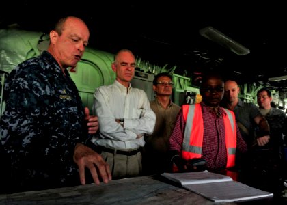 US Navy 101031-N-1531D-044 Capt. Thomas Chassee, commanding officer of the multi-purpose amphibious assault ship USS Iwo Jima (LHD 7), gives a tour photo