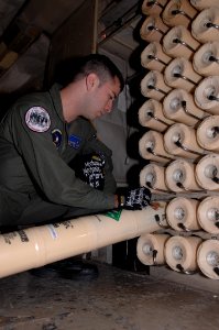 US Navy 101028-N-8623S-118 Naval Air Crewman (Avionics) 2nd Class Rolando Mireles, an in-flight technician assigned to Patrol Squadron (VP) 9, prog