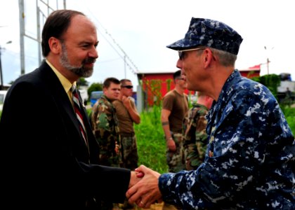 US Navy 101028-N-1531D-156 Capt. Thomas Negus, commodore of Continuing Promise 2010, meets with U.S. Ambassador to Suriname John Nay during the fir