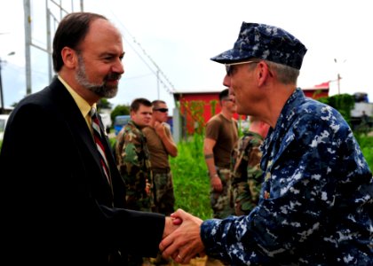 US Navy 101028-N-1531D-156 Capt. Thomas Negus, commodore of Continuing Promise 2010, meets with U.S. Ambassador to Suriname John Nay during the fir photo