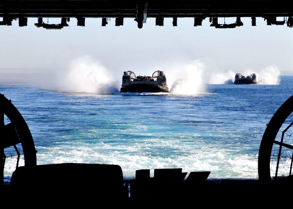 US Navy 101104-N-1722W-202 Landing craft air cushion (LCAC) vehicles operated by Marines assigned to the 13th Marine Expeditionary Unit (13th MEU)