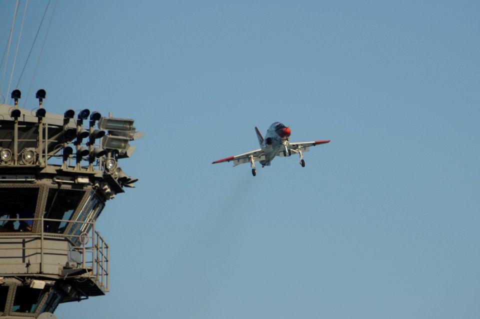 US Navy 101104-N-3327M-624 A T-45 Goshawk aircraft launches off the aircraft carrier USS Nimitz (CVN 68) during training wing carrier qualification
