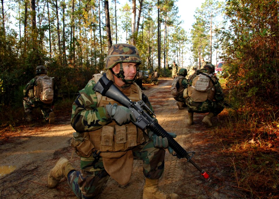 US Navy 101104-N-8816D-003 Chief Construction Mechanic James Sawyer participates in a training patrol during a khaki field training exercise