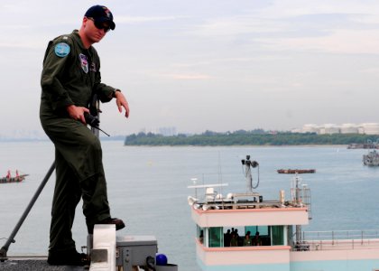 US Navy 101030-N-5538K-015 Lt. Scott Purcell supervises sea and anchor detail from the flight deck of the amphibious assault ship USS Essex (LHD 2)