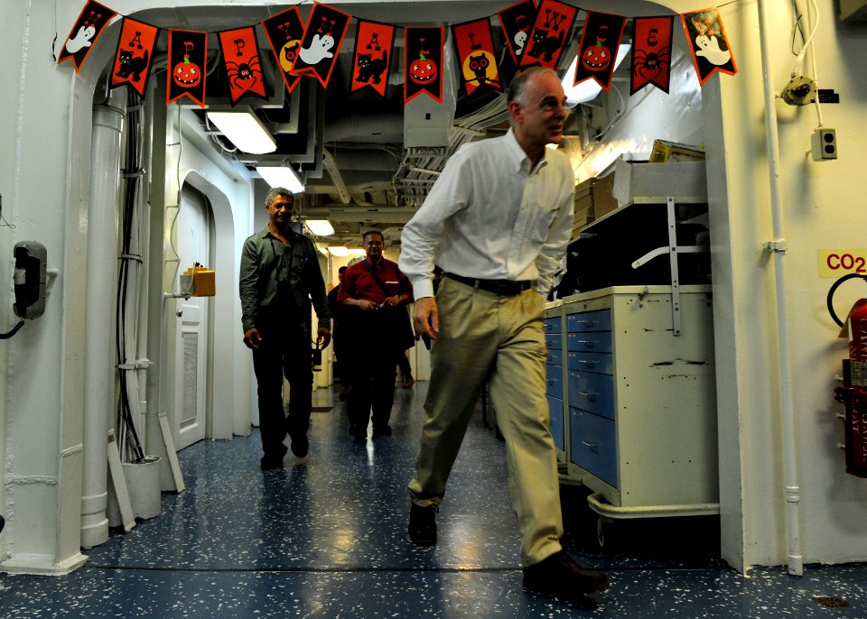 US Navy 101031-N-1531D-089 Dutch Ambassador to Suriname Aart Jacobi walks through the passageways of the medical department aboard the multi-purpos