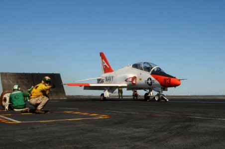 US Navy 101104-N-3327M-355 Lt. Cdr. Scott Menzies, a shooter aboard the aircraft carrier USS Nimitz (CVN 68), launches a T-45 Goshawk training airc