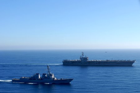 US Navy 101101-N-5684M-964 The aircraft carrier USS Ronald Reagan (CVN 76) is underway with the Arleigh Burke-class guided-missile destroyer USS Pr