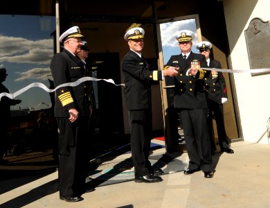 US Navy 101029-N-5085J-155 The official party vcut the ribbon during the Fleet Weather Center Norfolk, Va. establishment ceremony at Naval Station