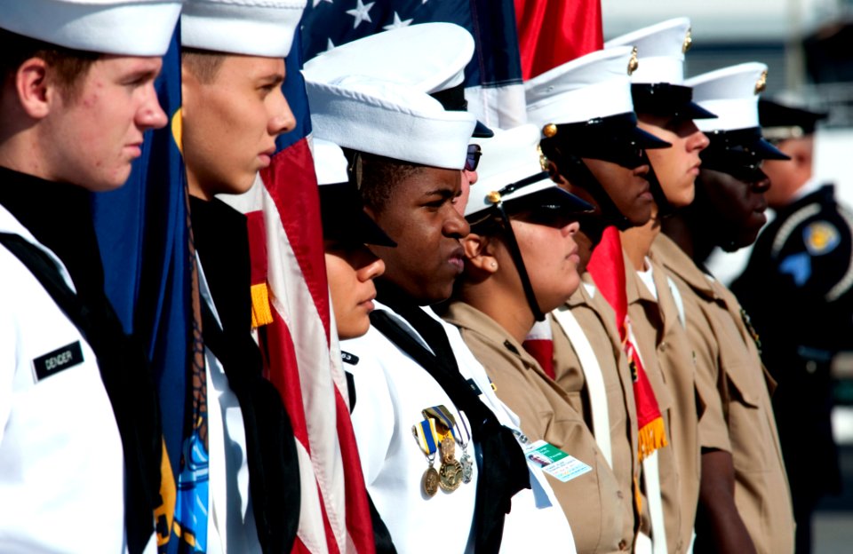 US Navy 101105-N-7948C-063 An honor guard stands at attention as the Arleigh Burke-class guided-missile destroyer Pre-Commissioning Unit (PCU) Jaso