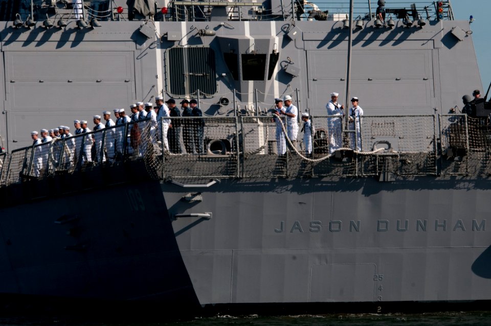 US Navy 101105-N-7948C-066 Sailors aboard the Arleigh Burke-class guided-missile destroyer Pre-Commissioning Unit (PCU) Jason Dunham (DDG 109) man