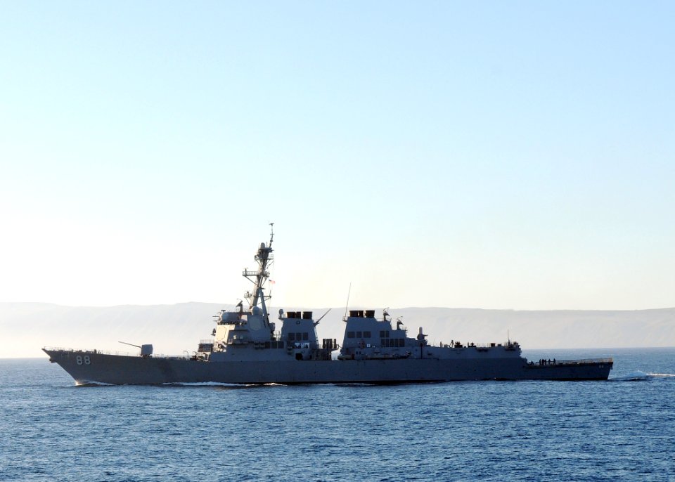 US Navy 101101-N-1004S-002 The Arleigh Burke-class guided-missile destroyer USS Preble (DDG 88) provides protection for the aircraft carrier USS Ro