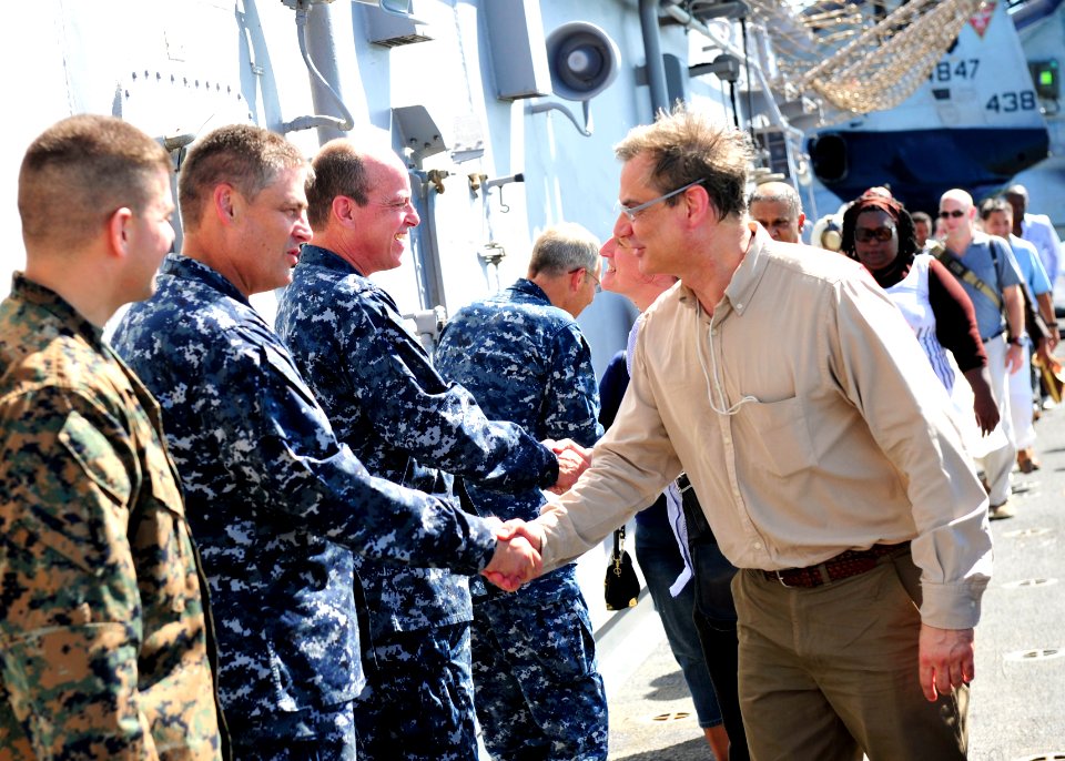 US Navy 101031-N-1531D-013 Capt. William Tanner, commander of the joint medical group for Continuing Promise 2010, greets Brazilian Ambassador to S