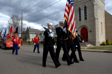 US Navy 101106-N-4275C-053 The color guard from Navy Information Operations Command Sugar Grove, W.Va. leads the way during a Veteran's Day parade