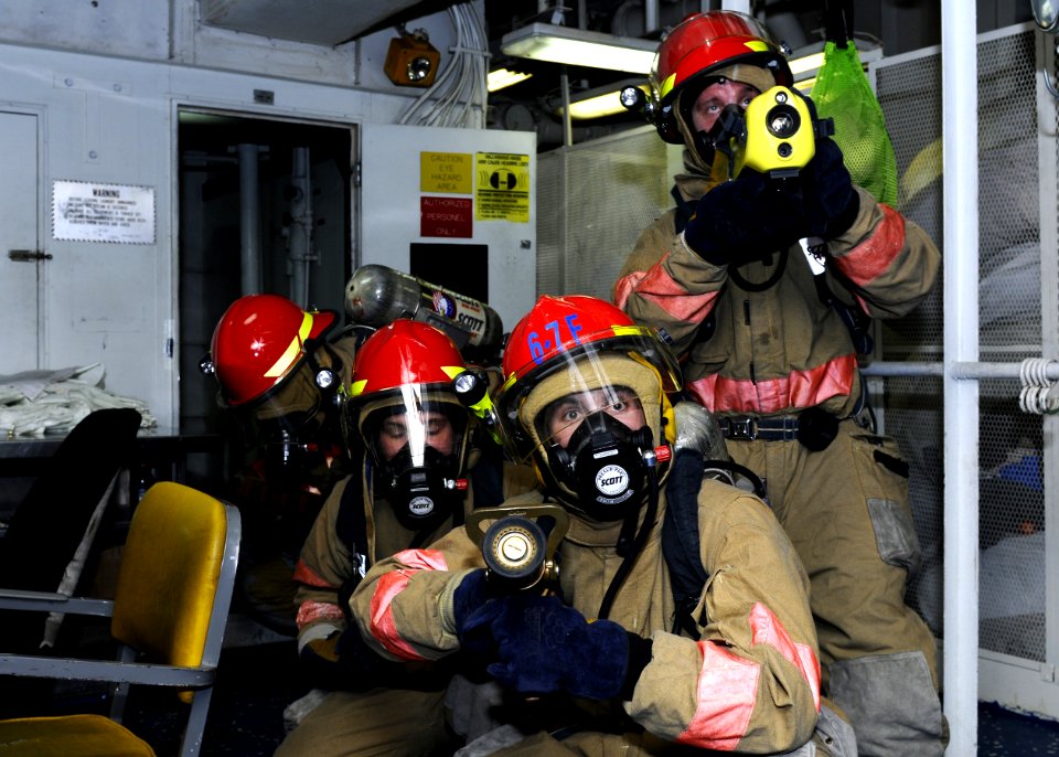 US Navy 101104-N-3154P-021 Members of an at sea fire party participate in a training exercise aboard the amphibious assault ship USS Kearsarge (LHD