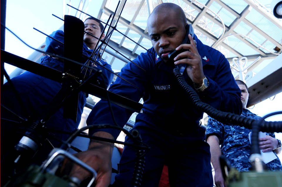 US Navy 101102-N-9132C-099 Information Systems Technician 2nd Class Dushunn Varner, from Monroe, La., performs a communications check