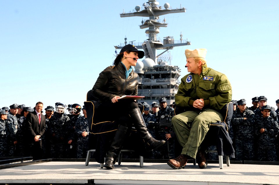 US Navy 101108-N-3885H-199 Dana Jacobson, left, one of the hosts of the ESPN2 television show, ESPN First Take, speaks with Rear Adm. Nora Tyson, c