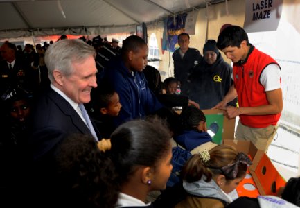 US Navy 101104-N-7676W-067 Secretary of the Navy Ray Mabus, watches New York school children build a laser maze during the opening of a new communi
