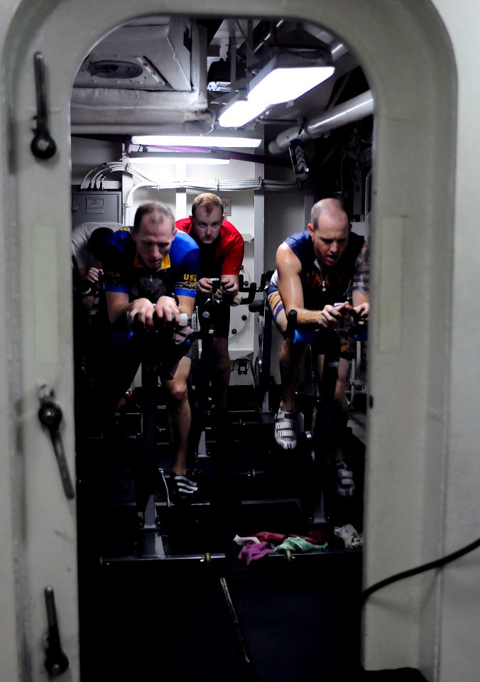 US Navy 101107-N-5503T-346 Lt. j.g. Chad Haack, left, and Master Chief Electronics Technician Jim Ritch cross the halfway point of the simulated bi
