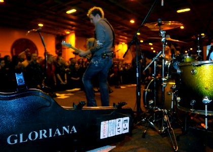 US Navy 101105-N-7095C-490 The country music band, Gloriana, performs in the hangar bay of the aircraft carrier USS Abraham Lincoln (CVN 72) photo