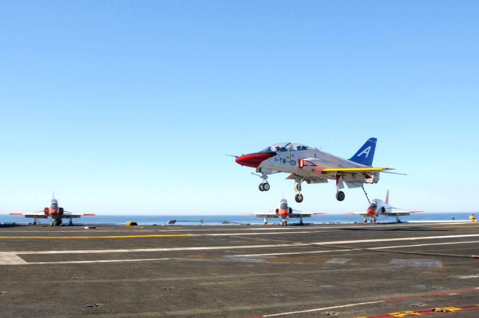 US Navy 101105-N-3327M-051 A T-45C Goshawk training aircraft lands aboard the aircraft carrier USS Nimitz (CVN 68) during training wing carrier qua