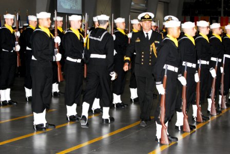 US Navy 101105-N-7042S-002 Commodore Stephen P. Woodall, Royal Australian Naval Attache, inspects the drill team during a graduation ceremony at Re