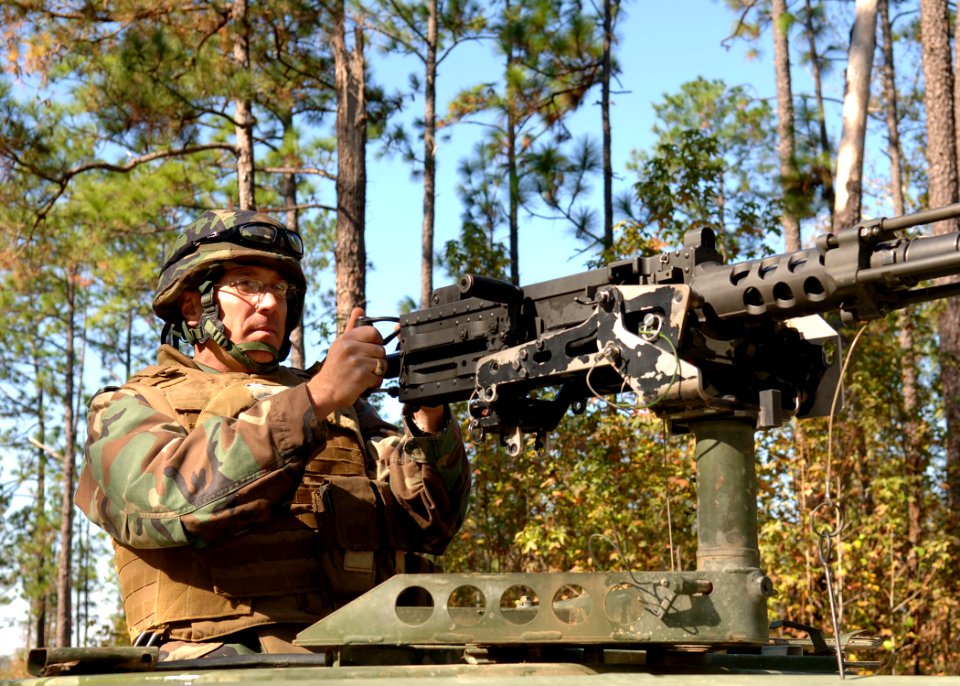 US Navy 101104-N-8816D-006 Master Chief Equipmentman Michael Neumann, assigned to Naval Mobile Construction Battalion (NMCB) 133, mans a M2 .50-cal