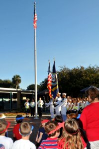 US Navy 101109-N-8102J-028 Members of the Naval Station Mayport Color Guard participate in a Veteran's Day ceremony at San Pablo Elementary School photo
