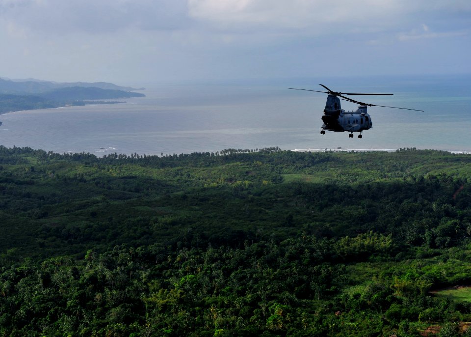 US Navy 101106-N-1531D-030 A CH-46E Sea Knight helicopter conducts aerial damage assessments of Haiti after Hurricane Tomas made landfall
