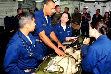 US Navy 101106-N-1722W-093 Cmdr. Karlwin Matthews, the senior medical officer aboard the amphibious assault ship USS Boxer (LHD 4)