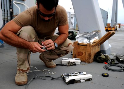 US Navy 101108-N-6266K-070 Explosive Ordnance Disposal Technician 2nd Class Michael Mannino, assigned to Explosive Ordnance Disposal Mobile Unit (E