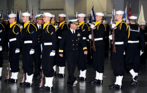 US Navy 101112-N-8848T-510 Rear Adm. David Steindl, commander of Naval Service Training Command (NSTC), inspects a drill team during a graduation c