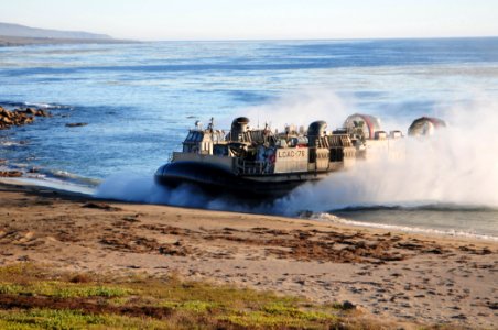 US Navy 101115-N-1722W-119 Landing Craft Air Cushion (LCAC) 76, from Assault Craft Unit (ACU) 5 embarked aboard the amphibious assault ship USS Box photo