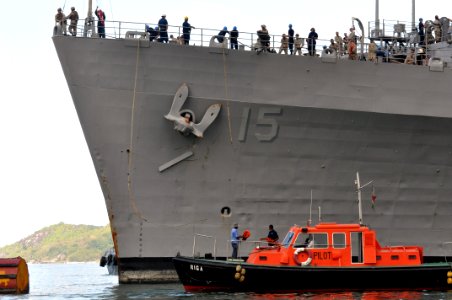 US Navy 101111-N-7293M-409 Sailors aboard the amphibious transport dock ship USS Ponce (LPD 15) haul in the mooring lines as Ponce gets underway
