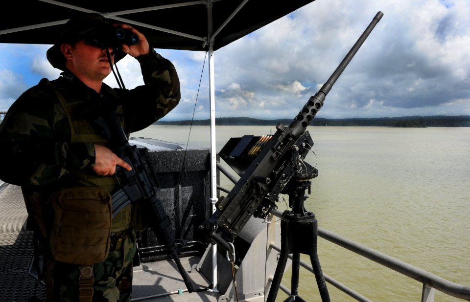 US Navy 101111-N-7589W-109 Master-at-Arms Seaman Gregory Seigmund stands aft watch aboard High Speed Vessel Swift (HSV 2) during its transit throu