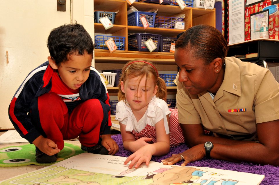 US Navy 101109-N-8102J-117 Aviation Structural Mechanic Airman Tamara Mitchell, assigned to Helicopter Maritime Strike Squadron (HSM) 40, reads wit