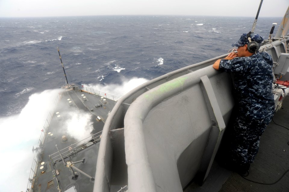 US Navy 101109-N-8335D-283 Seaman Robert Langlois stands the forward lookout watch aboard the amphibious dock landing ship USS Harpers Ferry (LSD 4
