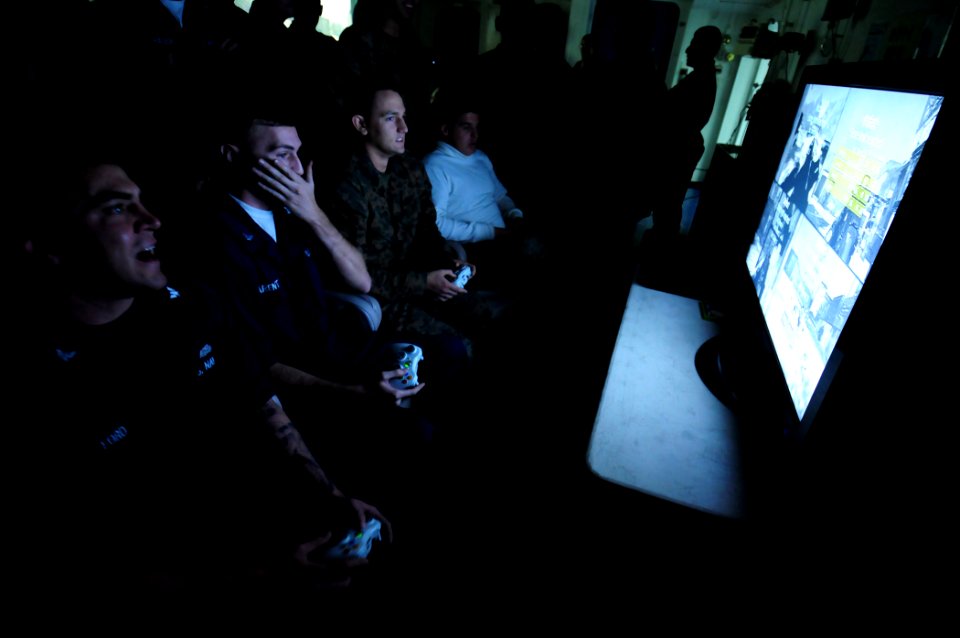 US Navy 101110-N-3659B-098 Sailors and Marines play an opening round match of a video game tournament sponsored by the morale, welfare and recreati