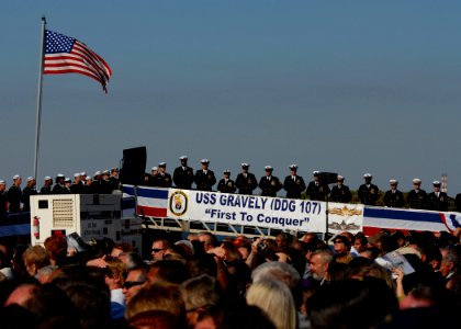 US Navy 101120-N-3737T-205 Sailors man the rails as the ship is brought to life during the commissioning ceremony for the U.S. Navy's newest guided