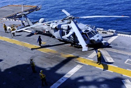 US Navy 101116-N-3154P-030 Sailors prepare an MH-60S Sea Hawk helicopter assigned to Helicopter Sea Combat Squadron (HSC) 22 for flight operations