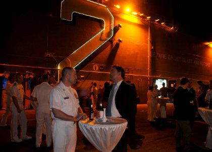 US Navy 101117-N-2218S-007 Sailors and Marines mingle with visitors from Hong Kong aboard the amphibious assault ship USS Essex (LHD 2)