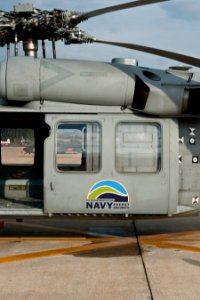US Navy 101118-N-0000X-001 A U.S. Navy MH-60S Sea Hawk helicopter assigned to the Blackjacks of Air Test and Evaluation Squadron (HX) 21 tests a 50