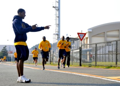 US Navy 101112-N-7103C-094 Personnel Specialist Seaman Kendall Kershaw times the mile and a half run portion of the Navy Physical Readiness Test at