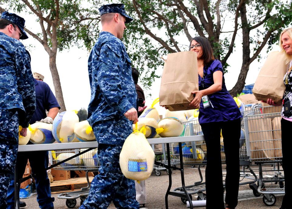 US Navy 101118-N-5694F-080 Sailors assigned to Naval Base Coronado receive complimentary food baskets and turkeys at the Naval Outlying Field Imper