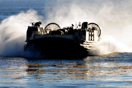 US Navy 101115-N-1722W-105 Landing Craft Air Cushion (LCAC) 76, from Assault Craft Unit (ACU) 5 embarked aboard the amphibious assault ship USS Box photo