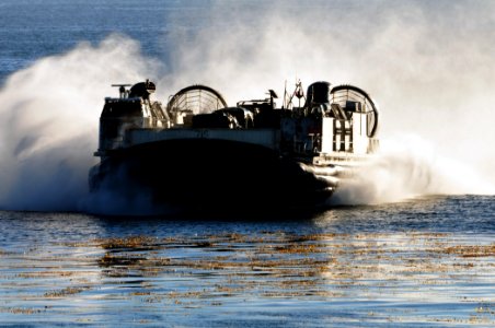 US Navy 101115-N-1722W-105 Landing Craft Air Cushion (LCAC) 76, from Assault Craft Unit (ACU) 5 embarked aboard the amphibious assault ship USS Box