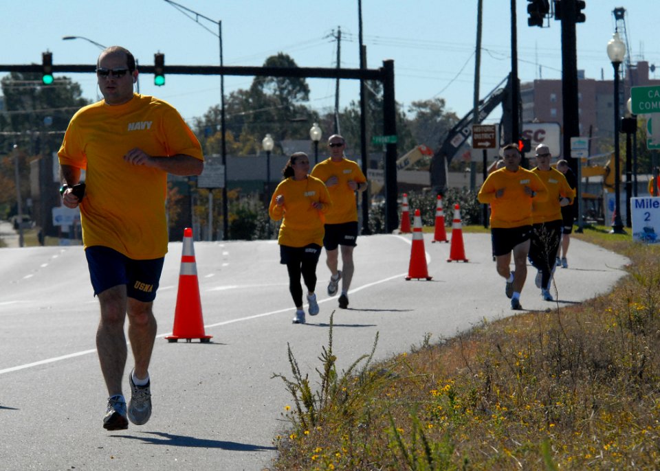 US Navy 101113-N-3737T-122 Sailors from the guided-missile destroyer Pre-Commissioning Unit (PCU) Gravely (DDG 107) participate in a 5 kilometer ru