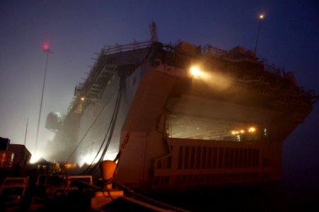 US Navy 101118-N-9643K-787 A view of the amphibious assault ship USS Bonhomme Richard (LHD 6) in early morning fog at Naval Station San Diego