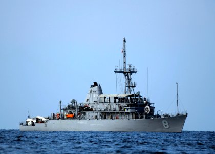 US Navy 101119-N-6266K-015 The Avenger-class mine countermeasures ship USS Scout (MCM 8) maneuvers in the Strait of Hormuz during joint mine counte