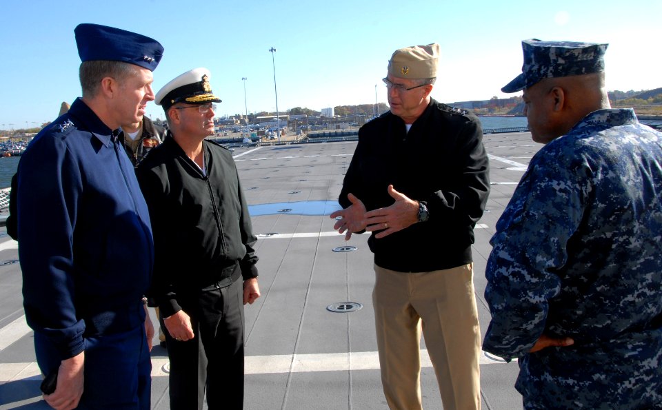 US Navy 101117-N-6764G-117 Vice Adm. Daniel P. Holloway, center, commander of U.S. 2nd Fleet, speaks to Vice Adm. Robert C. Parker, left